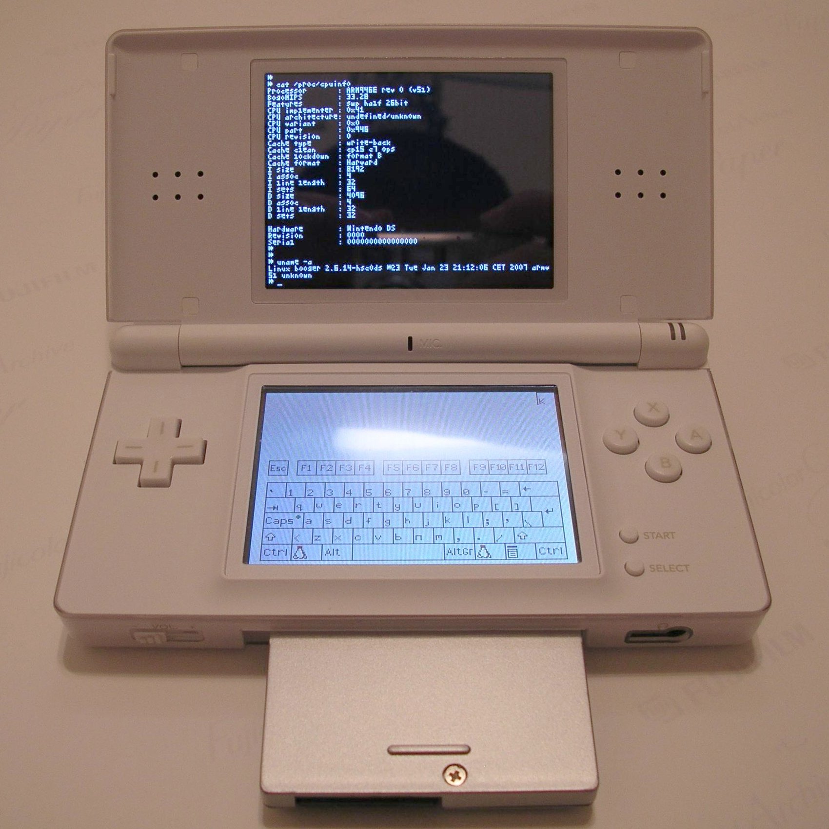 File:Ds lite with slot-2 device running dslinux.jpg - Wikimedia Commons