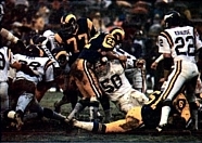 The Rams playing against the Vikings in the 1977 NFC Divisional Playoffs. 1986 Jeno's Pizza - 18 - Alan Page (cropped).jpg