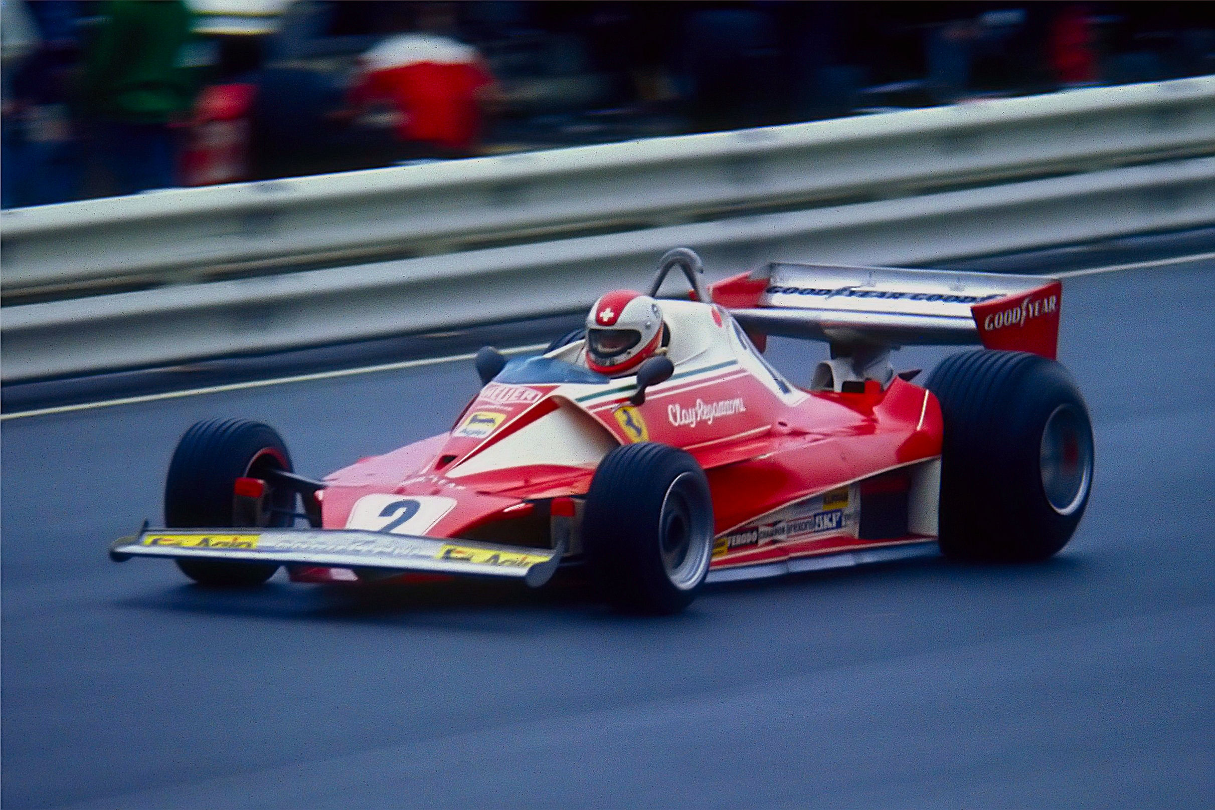 http://upload.wikimedia.org/wikipedia/commons/e/e7/Regazzoni%2C_Clay_am_31.07.1976_-_Ferrari_312T_2.jpg