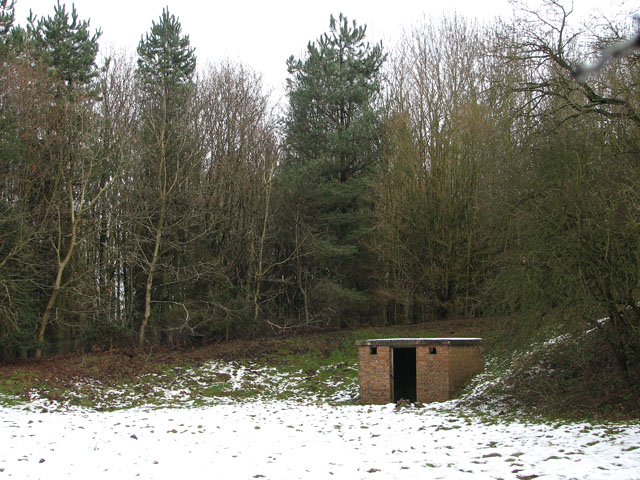 WWII_shelter_in_wintry_pasture_-_geograp