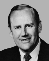 Upper-body portrait of a late-twentieth-century man in a suit.