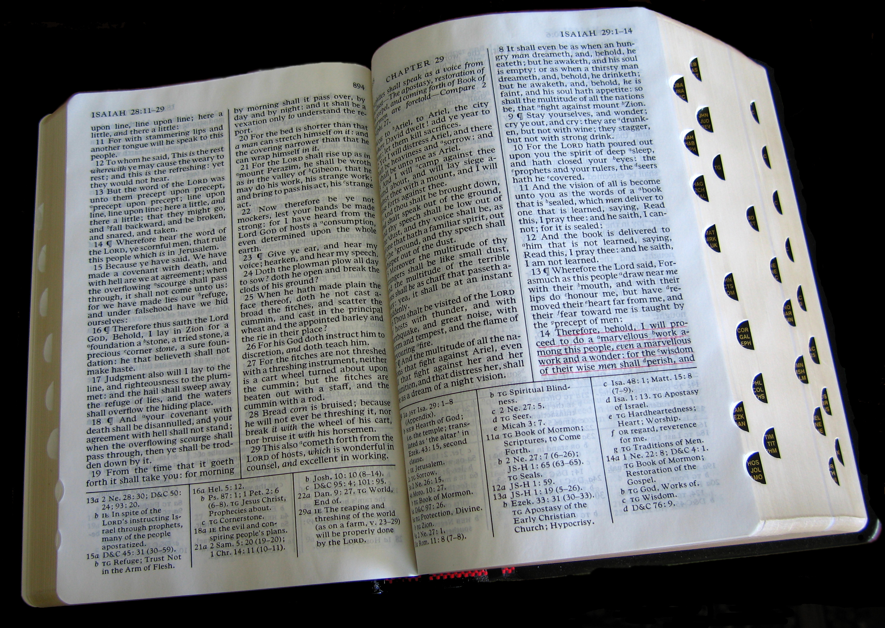 Quadruple combination opened to the Book of Isaiah (note the cross references between Biblical and Latter-day Saint scripture in the footnotes).