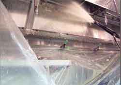Applying chemicals to a kitchen exhaust system...