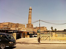 Leaning minaret of the Great Mosque of Al-Nuri in 2013. Destroyed by IS on 22 June 2017 during the Battle of Mosul. mnr@ lHdb.jpg