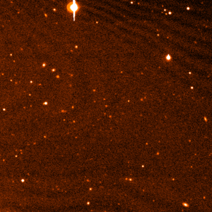 Animación que muestra el movimiento de 2003 UB313 en las imágenes usadas para su descubrimiento.