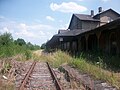 Bahnhofs-Empfangsgebäude mit Bahnsteigüberdachung