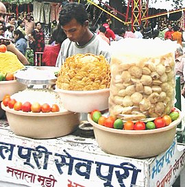 Bhel puri is a popular snack often sold on the roadside