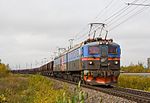 A Dm3 electric locomotive pulling an empty ore train approaching Kiruna in 2006