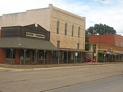 A view of Claude on U.S. Highway 287, with historic pharmacy building on the left