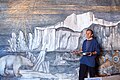 Raymond Dumoux dans son atelier devant « La fonte des glaces » Tempera sur toile - 500 × 300 cm - 2009