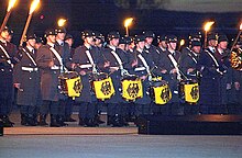 Corps of Drums at a tattoo (Grosser Zapfenstreich) in Germany, 2002. Grosser Zapfenstreich Ramstein Air Base 2002.jpg