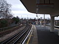 Looking south ("westbound") with siding visble on left (main group of sidings beyond the bend in the distance)