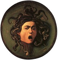 Michelangelo Merisi da Caravaggio, Scudo con testa di Medusa, olio su tela, tra il 1595 e il 1598, Galleria degli Uffizi.