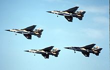 A formation of four Mirage F1CZs, flying over Air Force Base Ysterplaat, circa 1982 Mirage F1CZ Formation.jpg