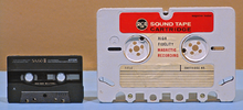 Size comparison of RCA tape cartridge (right) with the more common Compact Cassette RCA Quarter Inch Tape Cartridge 2A.png