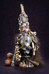 Statue of Sopona, the Yoruba god thought to cause the disease Sopona.jpg