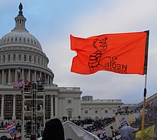 Trump supporters employed a variety of dominance imagery in flags, clothing and a mock gallows on January 6, 2021, when violent Trumpist rioters attempted to overturn the 2020 election, temporarily succeeding in preventing Congress from certifying Trump's loss. Tyler Merbler-TrumpUrinatingFlag detail.jpg