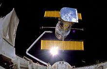 Hubble being deployed from Discovery in 1990 1990 s31 IMAX view of HST release.jpg