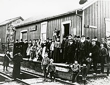 Crowd gathered in front of the Blair Grand Trunk Railway station in 1898 Blair GTR station crowd 1898.jpg