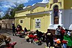 Flower sellers at the main gate of the Second Christian cemetery in Odessa during memorial days.