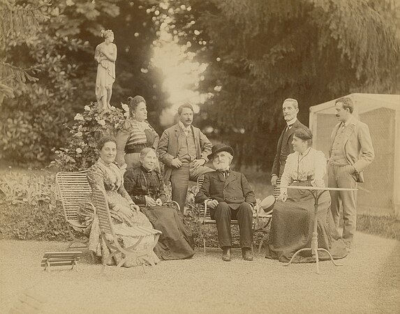 36. Seated: Maria Carrara Verdi, Barberina Strepponi, Giuseppe Verdi, and Giuditta Ricordi. Standing: Teresa Stolz, Umberto Campanari, Giulio Ricordi, and Leopoldo Metlicovitz