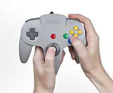 Kirby 64 was designed to use the N64 controller's analog stick as pictured, but this was changed to the D-pad during development. N64-Controller-in-Hand.jpg