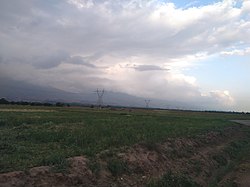 The northern and western gardens of Fushanjan are visible in the right corner of the picture. The picture was taken from a dirt road accessible from the Baghrud Road of Nishapur.