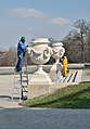 Workers renovating vases in the gardens of Schönbrunn. User:Herzi Pinki