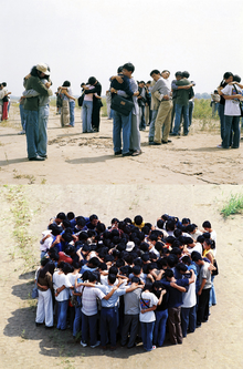 Photography of the Gao Brothers performance, The Utopia Of the 20 Minute Embrace, 2000