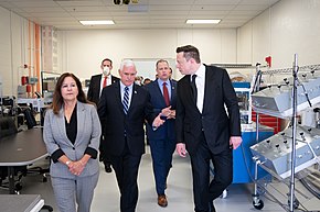 Musk with Vice President Mike Pence and Second Lady Karen Pence in 2020 Vice President Pence at the Kennedy Space Center (49945667303).jpg