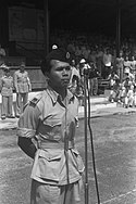 Rijadi berpidato dalam pertemuan massal pemindahan kekuasaan Kota Solo dari Belanda ke Indonesia pada 1949.