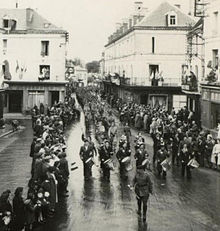 Black and white photograph of a military parade.