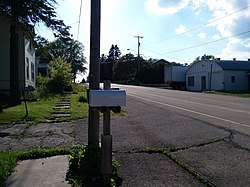 County Road O is the primary and sole modern-day thoroughfare for the small hamlet.