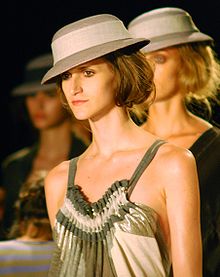 Issues about equality of outcome measured for groups have been raised about the skin color of runway models at the Sao Paulo Fashion Week and in 2009 quotas requiring that at least 10 percent of models be "black or indigenous" were imposed as a substantive way to counteract a "bias towards white models", according to one account. Daiane Conterato2 crop.jpg