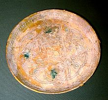 This earthenware dish from 9th century Abbasid, Iraq is one of the many artifacts exhibited at the Freer Gallery. Dish from 9th century Iraq.jpg
