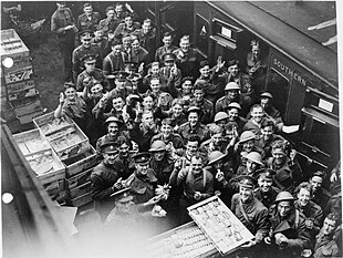 Evacuated troops enjoying tea and other refreshments before boarding a train at Dover Station, 26-29 May 1940 Dunkirk 26-29 May 1940 H1631.jpg