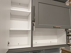 frameless wall cabinets with shelves behind doors