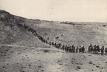 Greek Christians in 1922, fleeing their homes from Kharput to Trebizond. In the 1910s and 1920s the Armenian, Greek, and Assyrian genocides were perpetrated by the Ottoman government Kharput Greek-Orthodox refugees - C.D.Morris - National Geographic, Nov. 1925.jpg