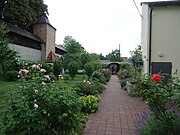 Klostergarten St. Ursula mit Innenseite der östlichen Mauer der Oberen Stadt südlich des Vogeltores der Jakobervorstadt