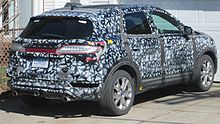 During testing, automakers commonly disguise upcoming car models with camouflage paint patterns designed to obfuscate the vehicle's lines. Padded covers or deceptive decals are also often used. This is also to prevent motoring media outlets from spoiling the model before its planned reveal. Lincoln MKC test vehicle.jpg