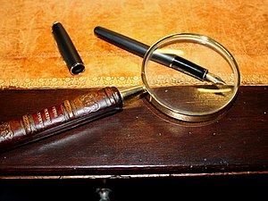magnifying glass on an 17th century table