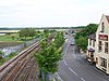 View from the modern road bridge which crosses the old road, railway and River Test adjacent to the Anchor Hotel