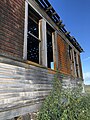 Side of abandoned 1906 schoolhouse in Govan