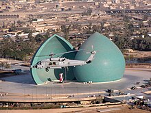 The al-Shaheed Monument in Baghdad dedicated to the Iraqi soldiers who died in the Iran-Iraq War US Navy 031130-N-0000S-001 An HH-60H helicopter assigned to the Firehawks of Helicopter Combat Search and Rescue Squadron-Special Warfare Support Special Squadron Five (HCS-5).jpg