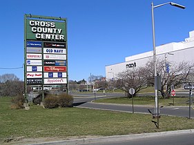 The iconic former marquee of the Cross County Center with Macy's in the background