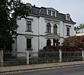 Villa mit Einfriedung