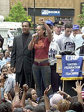 Keys protesting with Benjamin Chavis in 2002 Alicia Keys at Education Rally.jpg