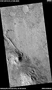 This straight ridge may be a dike that has been exposed by erosion. It was initially formed by magma moving under the surface along weak spots. The picture was taken with HiRISE under the HiWish program.