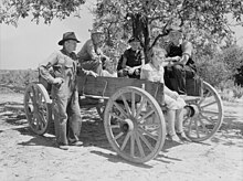Family in a wagon, Lee County, Mississippi, United States, August 1935 Family in a wagon, Lee County, Mississippi, 1935.jpg