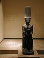 Estatua del faraón Horemheb ante el dios Amón